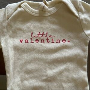 Tenth and Pine Cream Baby Onesie with Red 'Little Valentine' Print